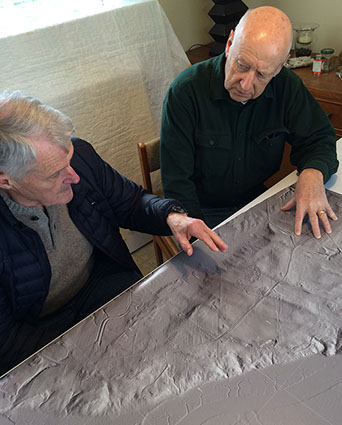 Bruce Bourque and Fred Koerber examining a LiDAR-derived image.